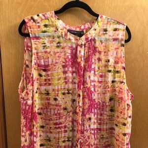 Sleek sleeveless button up blouse